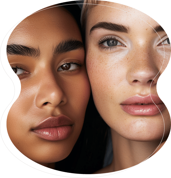 Two women with smooth, clear skin and natural makeup pose closely together, highlighting their facial features and flawless Nanobrows against a neutral background.