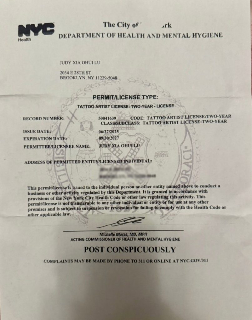 A New York City Department of Health and Mental Hygiene tattoo artist license for Judy Xia Ohui Liu, valid from September 8, 2023, to September 6, 2027, is displayed, highlighting her commitment to Beauty Care and After care Tips.